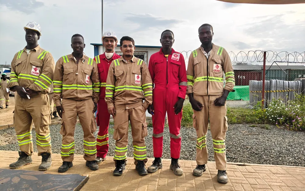 IXAR Africa site board and crew, Tilenga Project, Uganda